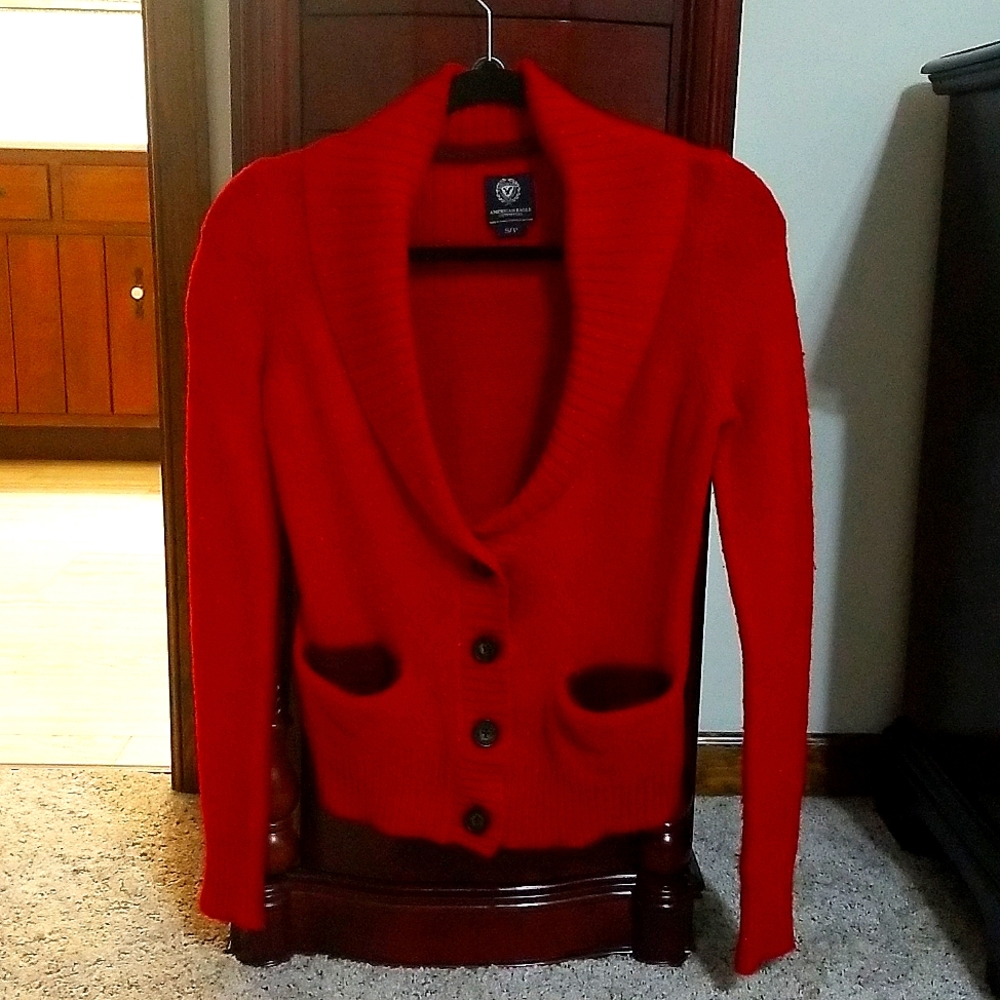 Woman's small American eagle cardigan with buttons and front pockets